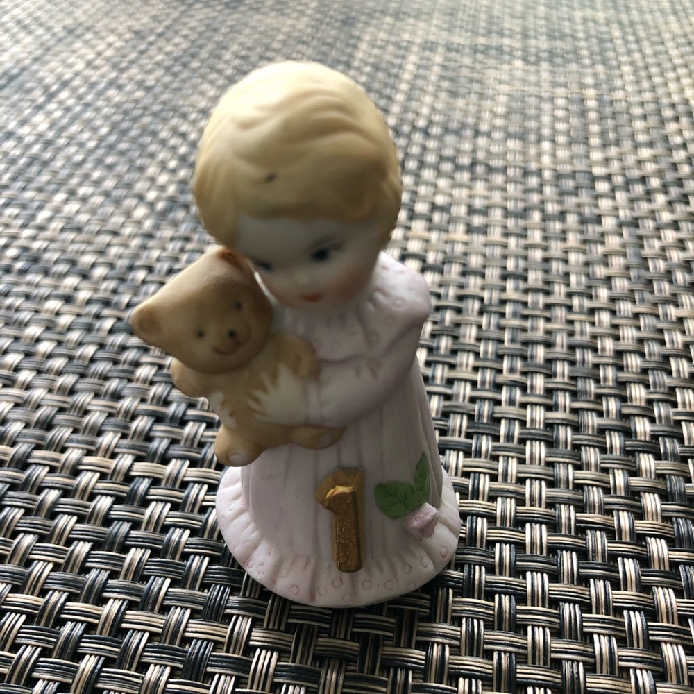 Growing up girl by Enesco age one
